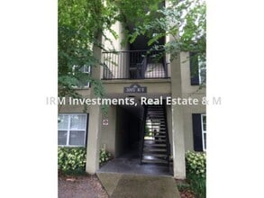 Building Photo - 1 bed 1.5 baths condo with DEN,