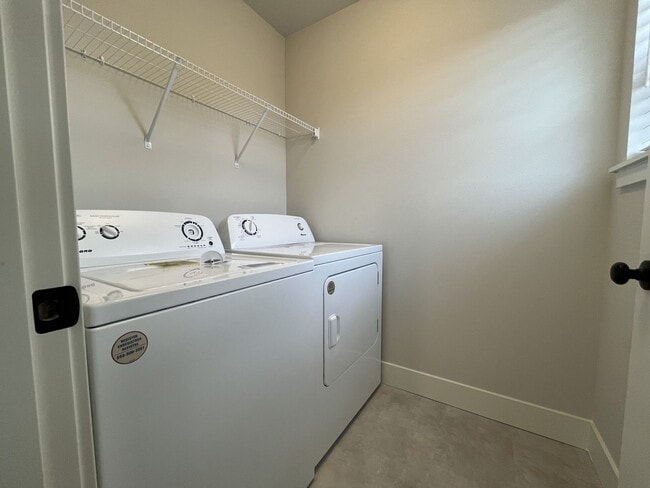 Building Photo - Modern 2025-Built 4 Bedroom Home with EV Charging, 5kW Solar, Open-Concept Living, Scenic Outdoor...