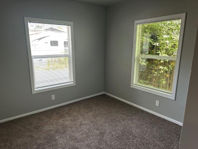 Building Photo - UPDATED single family home, with large yard!