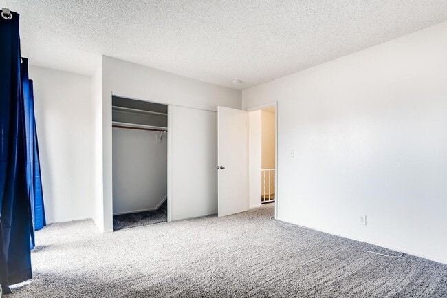 Building Photo - ADORABLE TOWN HOME with BALCONY and a GREAT SIZE PATIO/"BACKYARD"