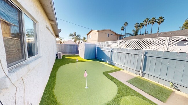 Building Photo - Charming 2-Bedroom Home with Mini Golf Course, Spacious Yard, and Ample Parking