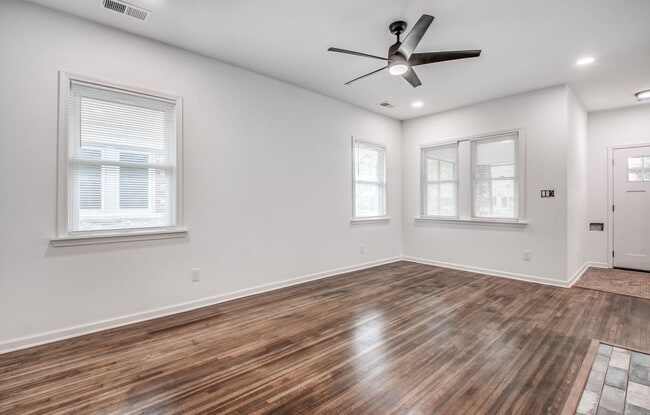 Building Photo - Live Stylishly. Live Comfortably. Live Mem...