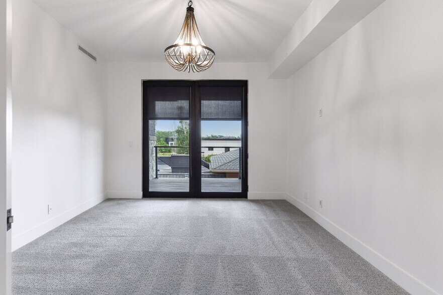 Retreat to the luxurious primary suite at the end of the day - 222 Ferndale Rd S