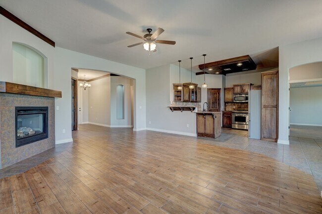 Building Photo - Stunning 3 Bedroom Home with Fireplace, Community Amenities & Open Floor Plan