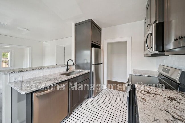Building Photo - 1437 S Peoria Ave