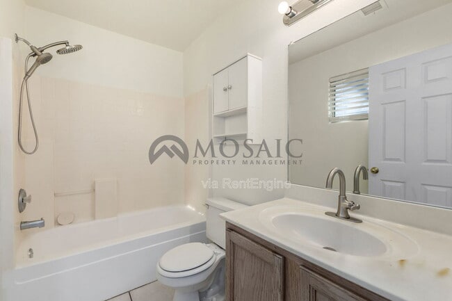 Building Photo - 703 W Hess Ave