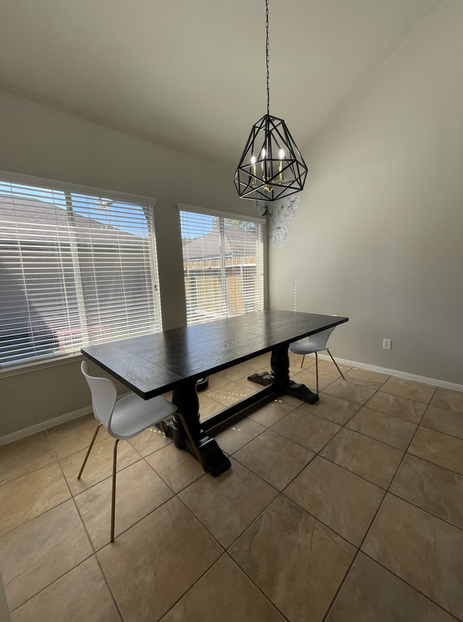 View of the Dining Room from the Living area - 6633 Queensclub Dr