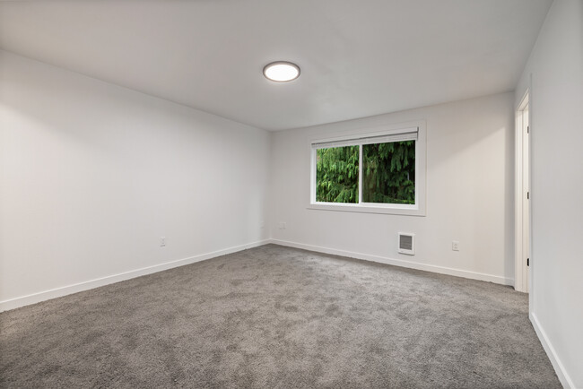 Large master bedroom with plush carpet - Rosedale Townhomes