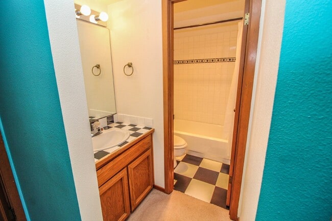 Building Photo - Spacious 4-Bedroom Home with Stunning Lake...