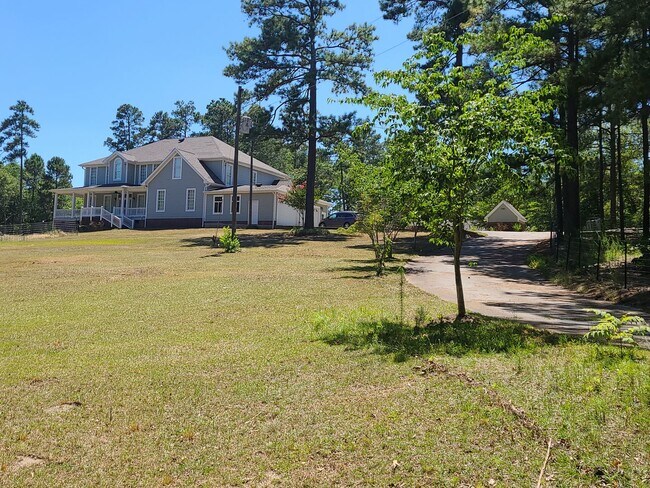 Building Photo - Serene 3-Acre Homestead in Sanford, NC – Ideal for Country Living!