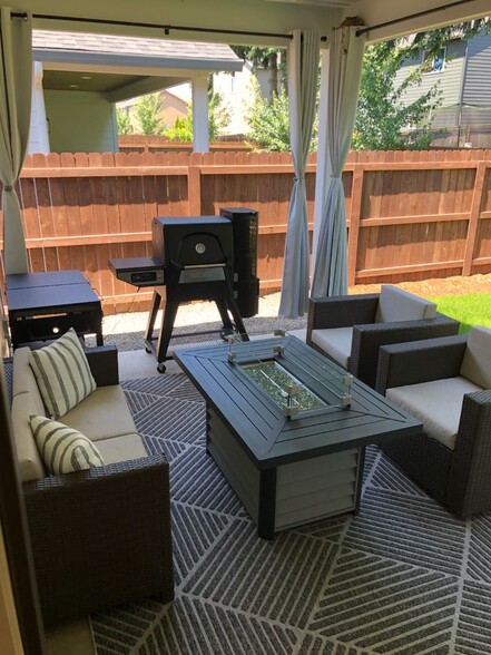 What the Covered Patio looks like furnished - 12048 NE 109th St