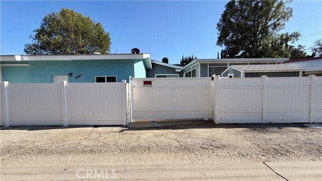 Building Photo - 7845 Woodlake Ave