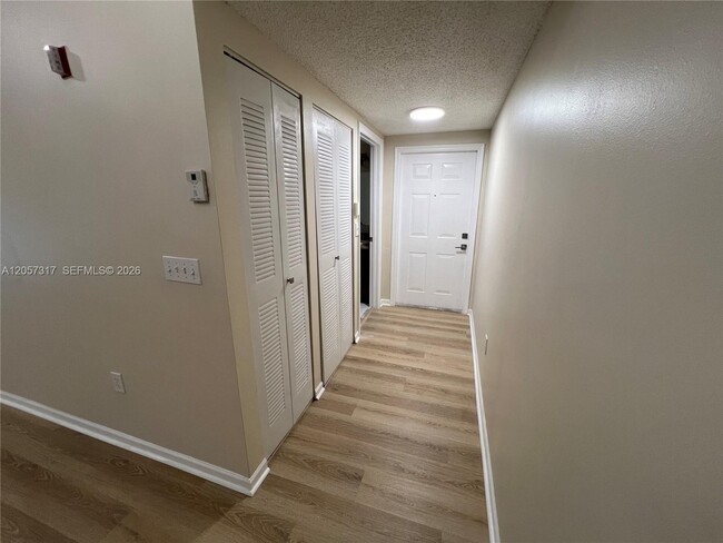 Building Photo - 3261 Sabal Palm Manor