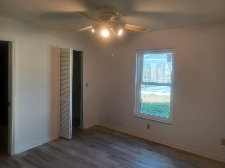 Building Photo - COMING SOON: Spacious Gulf Access 3 BR / 3 BA Home With a Large Screened Lanai for Entertaining &...