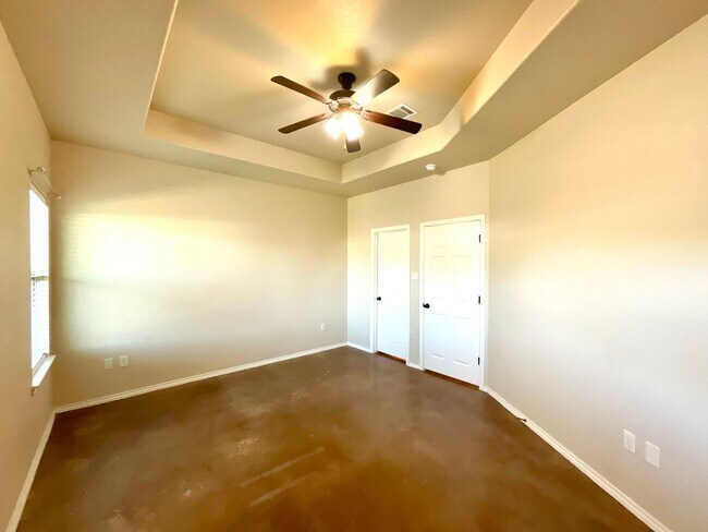 Building Photo - High Ceilings, Fenced Yard & 2-Car Garage – New Braunfels Living!