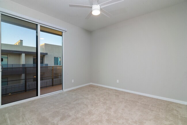 Guest Bedroom with Balcony and Motorized Shades - 901 S Smith Rd