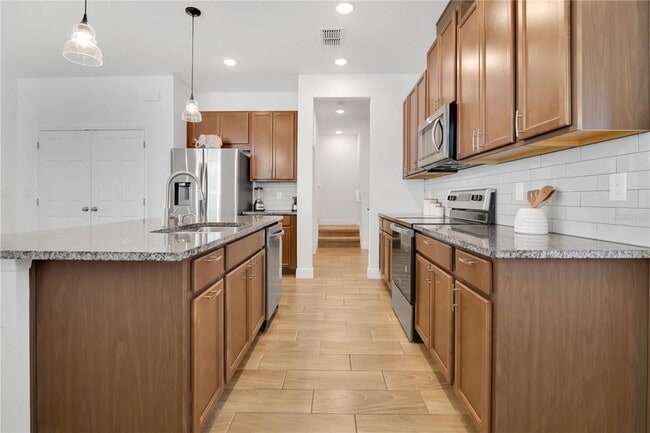 Building Photo - 3280 Canna Lily Pl