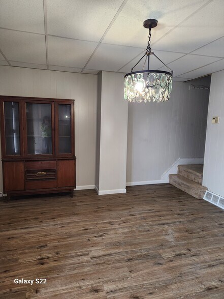 Dining room with plank floor - 85 Highland Ave