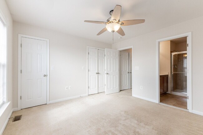 Building Photo - This beautiful townhouse has everything you need in a dream home.