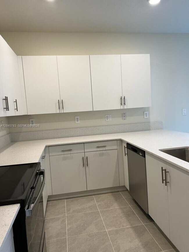 Building Photo - 11444 West 33rd Ct