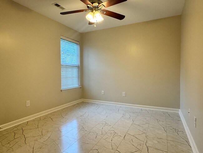 Building Photo - Beautiful, Conveninetly located First Floor Condo