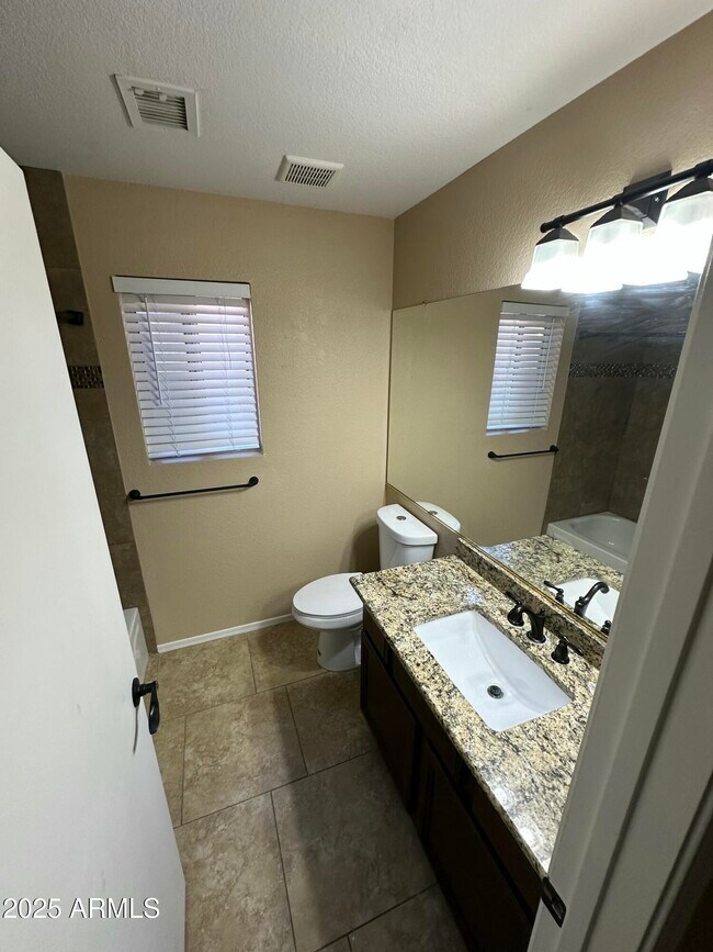 Building Photo - 4833 W Taro Dr