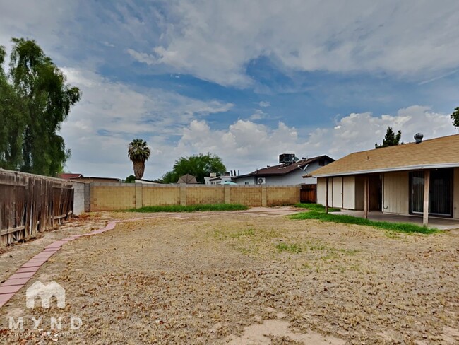 Building Photo - 7233 W San Miguel Ave