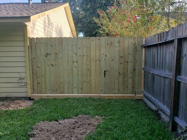 New fence to create private yard area - 10015 Valley Lake Dr