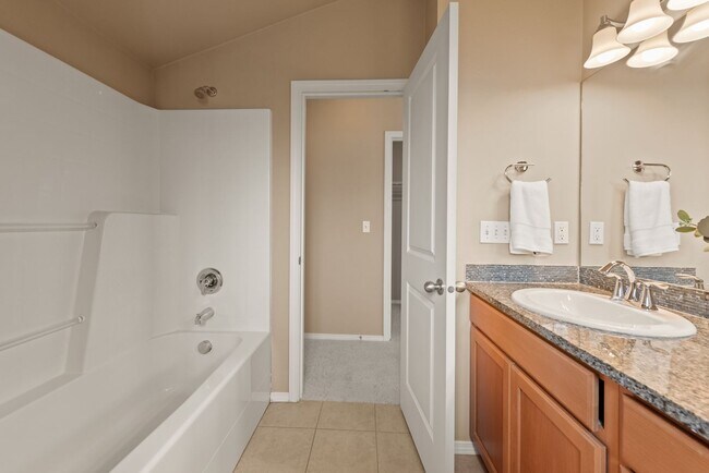 Building Photo - 4BR + Den Greenwood Home with Private Suite & 2-Car Garage