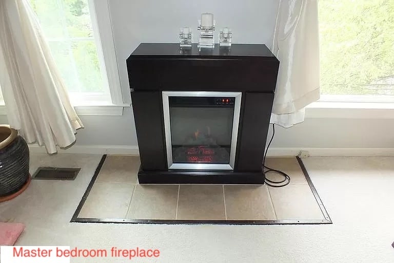 Master bedroom fireplace - 11809 Rockaway Ln