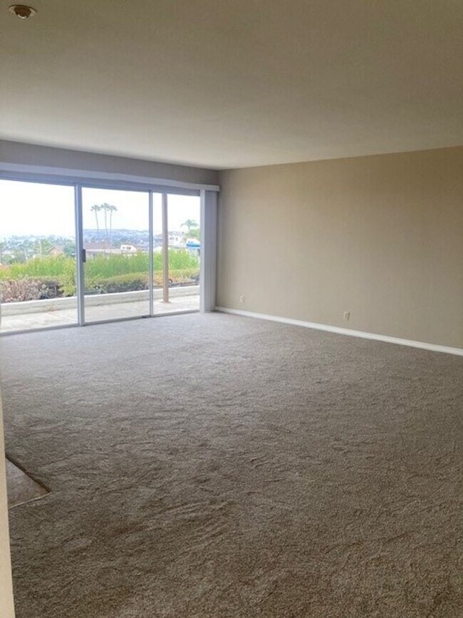 Building Photo - Single level 2-bedroom 2-bath home in private community of Ocean Hills