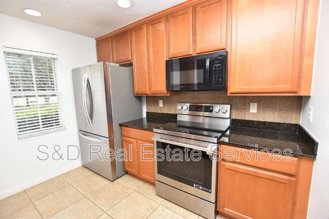 Building Photo - 5365 River Rock Rd