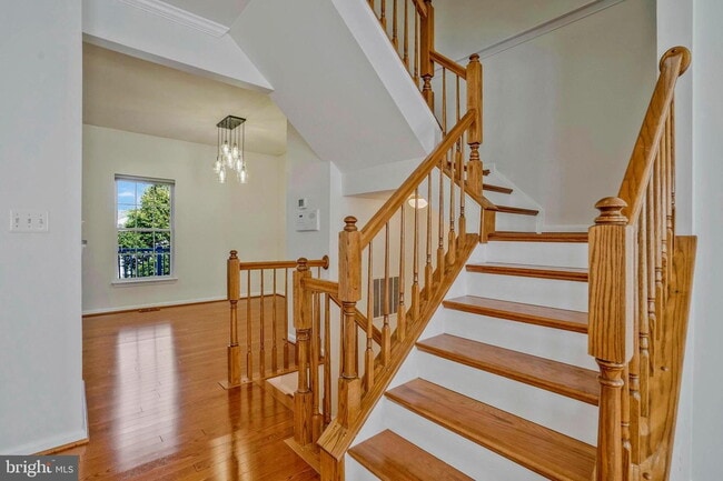 Building Photo - This beautifully maintained brick-front, three-level townhome is located in a highly sought-after...