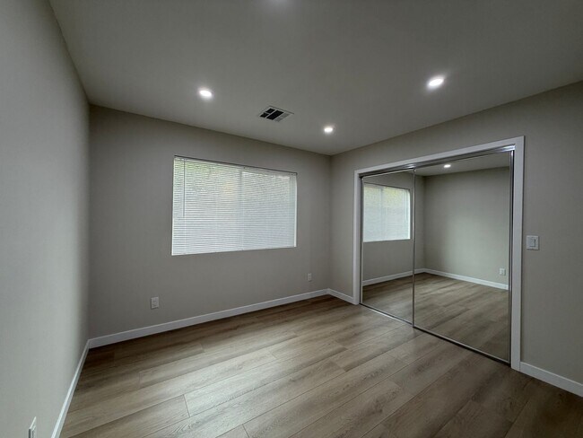 Building Photo - 11705 Woodley Ave