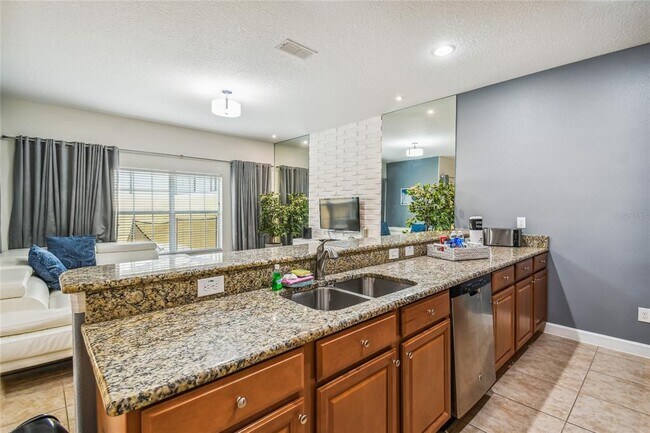 Building Photo - 8841 Candy Palm Rd