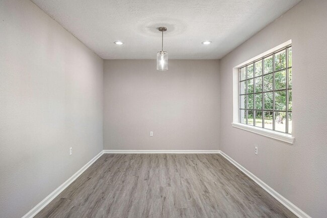 Building Photo - Updated 4 bedroom, 3 bath, single story house on a 20500 sq ft lot in Roman Forest!! Upgrades inc...