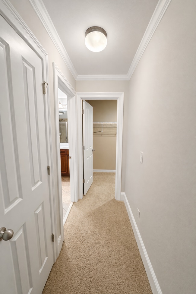 Building Photo - Gated Johns Creek Townhome Offering Space, Privacy, and Everyday Convenience