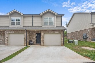 Building Photo - Two Bedroom in Sango!
