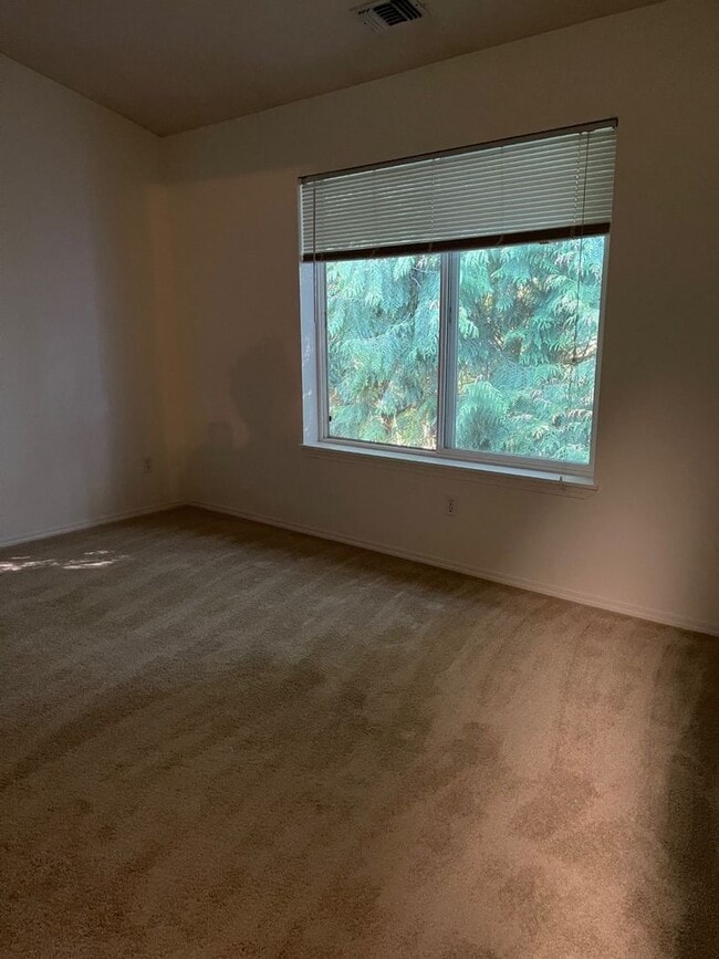 Building Photo - Bright, Spacious, Updated Condo with Separ...