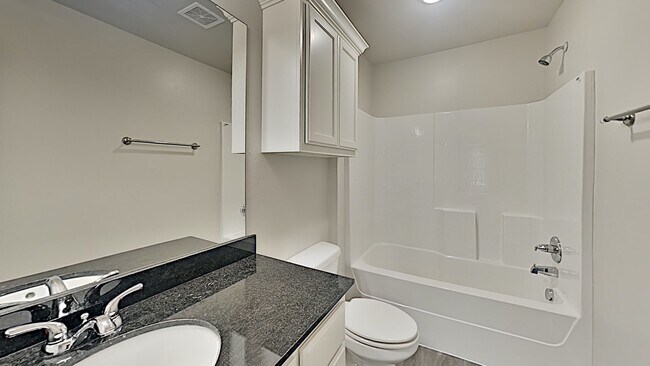 Building Photo - 3 Bedroom 2 Bath Duplex With 2 Car Garage Located Close to the Broadway Extension and 8 minutes f...