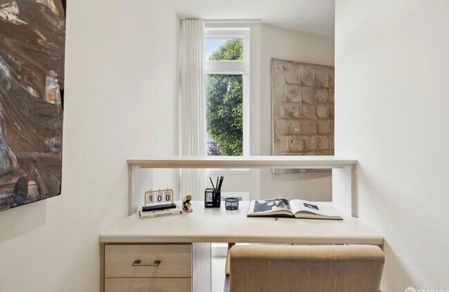 Building Photo - One-of-a-Kind Sophisticated Top-Floor Cond...