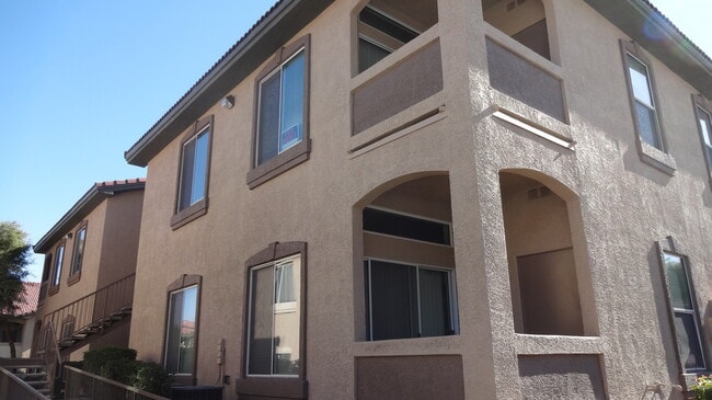 Building Photo - SECOND STORY CONDO IN GATED COMMUNITY WITH...