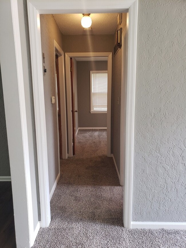 Building Photo - Remodeled Raytown Home-Coming SOON!!