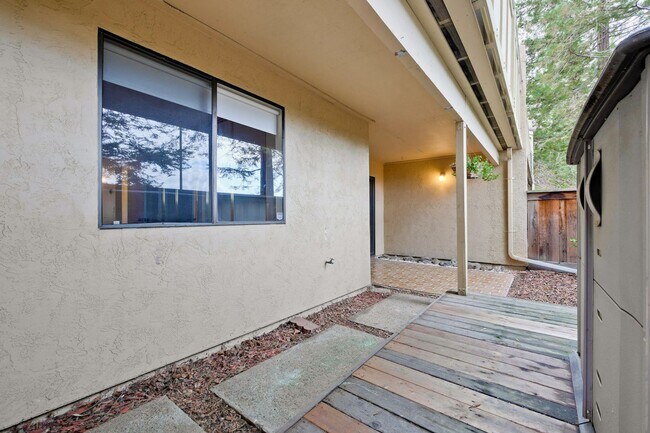 Building Photo - Stylish End-Unit Condo l Private Patio l Community Pool