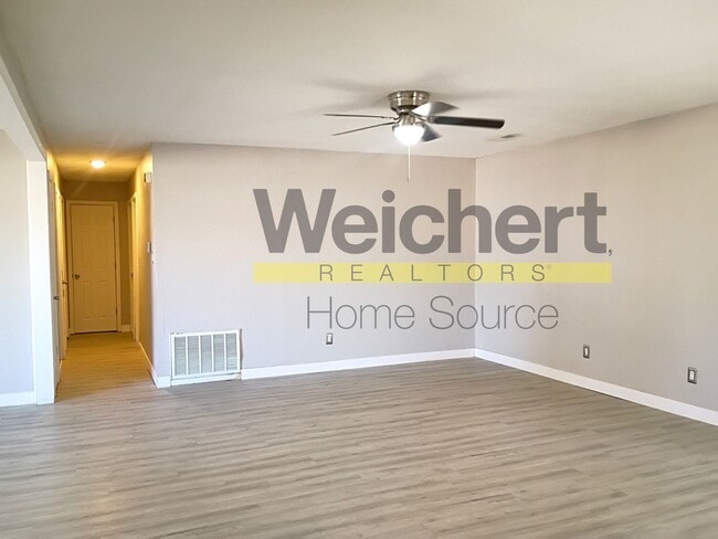 Building Photo - Updated 4-Bed Home with Fenced Yard & Carport