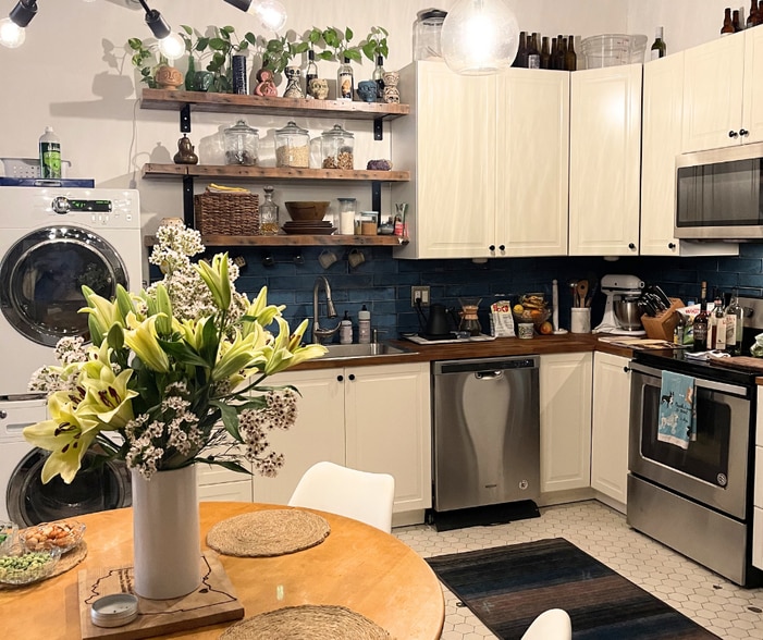 Upgraded, stainless steel appliances and updated backsplash. - 108 W 2nd St