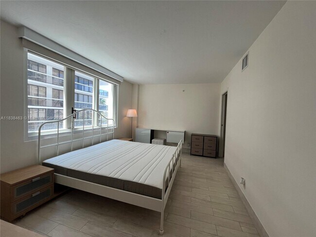 Building Photo - 9499 Collins Ave