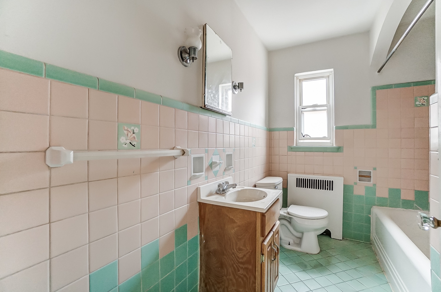 Bathroom also features original tile - 1711 Portman Ave