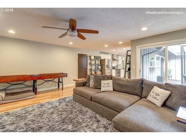 Building Photo - Spacious 4-Bedroom Home with Multiple Livi...
