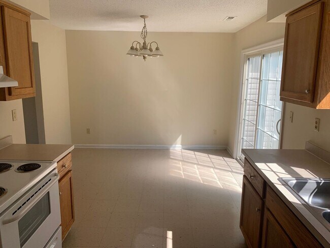 Building Photo - City Home located in Quiet Community